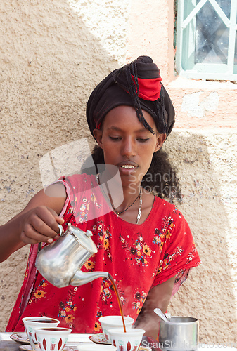 Image of Ethiopian traditional Coffee ceremony, crafting street bunna coffee, Tigray Region Etiopia