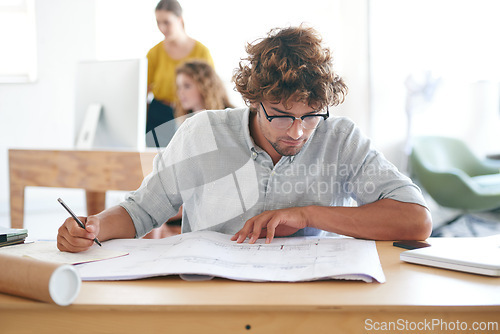 Image of Paper, table and architect with floor plan in office for writing, brainstorming and building design. Strategy, man and blueprint on desk with thinking for idea, vision and property development