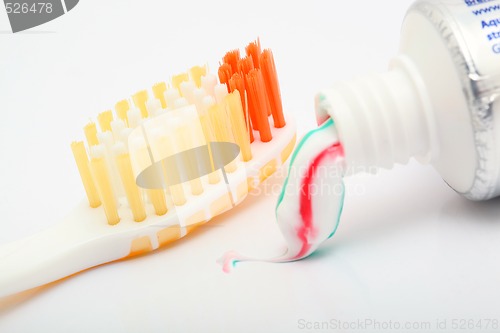 Image of yellow toothbrush