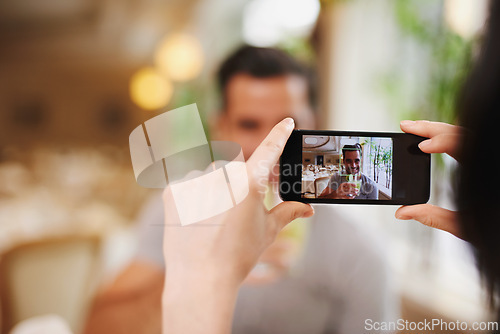 Image of Restaurant, picture and couple with smartphone, screen and connection with mobile user and photograph. Date, man and woman with cellphone or digital app for memory and romance with Valentines day