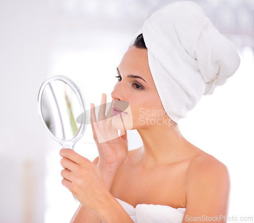 Image of Woman, mirror and skincare with beauty for hygiene, facial treatment or anti aging moisturizer at home. Young female person or model touching skin with reflection for spa, dermatology or cosmetology