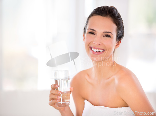 Image of House, happy woman or skincare portrait for drinking water in morning routine for hydration in living room. Beauty, healthy female person or smile with cosmetic for natural glow, detox and confidence