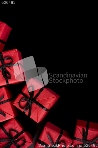 Image of red gift boxes on black