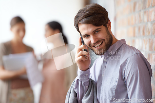 Image of Project, happy or businessman on a phone call talking, networking or speaking of ideas in office. Wall, mobile communication or male entrepreneur with smile, deal or contact for negotiation offer