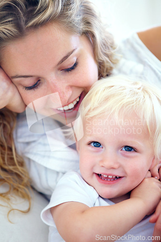 Image of Portrait, mom and baby bonding in home with smile, support and quality time with happy family wellness. Relax, mother and face of toddler son with love, growth and child development in apartment.