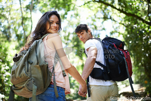 Image of Travel, hiking and portrait of couple holding hands for adventure, freedom and walking outdoors. Forest, nature and happy man and woman backpacking for holiday, vacation and trekking for wellness