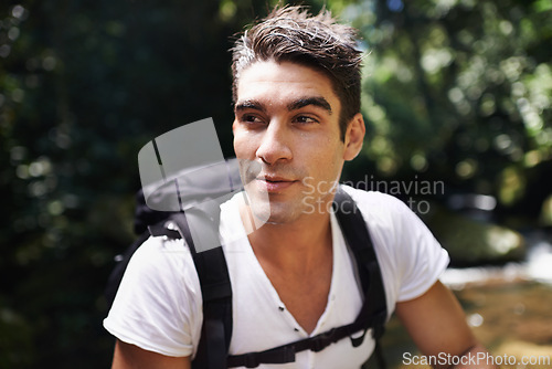 Image of Travel, hiking and man in nature for adventure, vacation or holiday with backpack in Colombia. Outdoor, forest and young male person trekking with bag by lake water in woods on weekend trip.