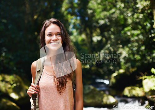 Image of Hiking, forest or happy woman with smile in nature or wilderness for a trekking adventure. Relax, bag or excited female hiker walking in a natural park or woods for exercise or wellness on holiday