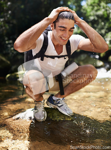 Image of Travel, trekking and wet man by water for adventure, vacation or holiday with backpack in Colombia. Nature, forest and young male person hiking with bag by lake for refresh in woods on weekend trip.