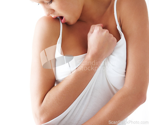 Image of Emotion, feeling and grabbing clothes with woman in studio isolated on white background for release. Hands, sexy and sensual with young feminine person closeup for desire, passion or satisfaction