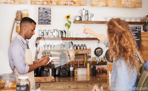 Image of Barista, cafe and customer service with drink, order and menu for choice, writing and helping. Small business owner, cashier or waiter listening to person for decision on sale and coffee shop startup