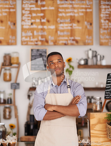 Image of Cafe, black man and barista thinking of small business as entrepreneur, professional and shop owner. Male person, standing and thoughtful of idea for startup of store in food industry of Cape Town