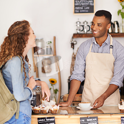 Image of Coffee, smile and barista serving customer in bakery, cafe or deli for small business retail or food industry. Small business startup or bistro and man server in restaurant with woman consumer
