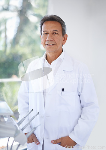 Image of Senior dentist, man in portrait and dental for teeth whitening and orthodontics with oral health at practice or clinic. Healthcare, medical professional and expert orthodontist with service for mouth