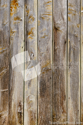 Image of Weathered wooden planks displaying natural textures and patterns