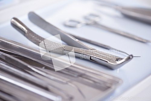 Image of Dental, instrument and tools equipment as closeup for treatment consultation for examination, cleaning or hygiene. Explorers, scaler and teeth care for oral help for dentist checkup, tooth or forceps