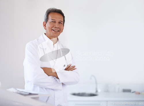 Image of Portrait, dentist and doctor man in office with confidence, expert advice and orthodontics for medical health. Dental medicine, healthcare and professional with pride, arms crossed and oral service.