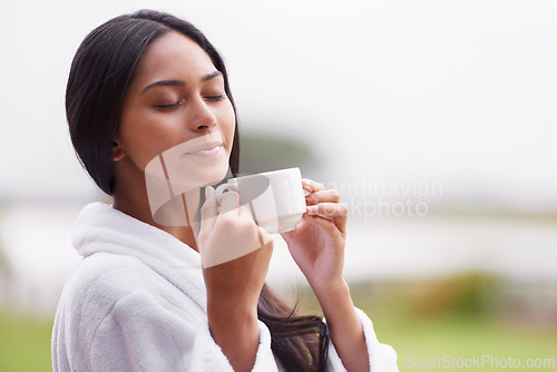 Image of Spa, beauty and woman relax with coffee for skincare, wellness and treatment in luxury salon. Resort, garden and person for massage, therapy and cosmetics for relax, calm and self care outdoors