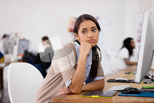 Image of Tired, woman and bored in coworking space with computer for planning, schedule and ideas for job. Businesswoman, thinking and technology in office with depression, exhausted or burnout at desk