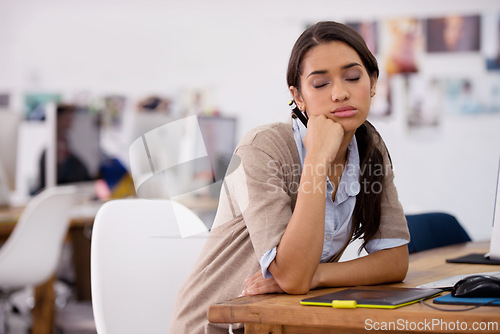 Image of Woman, tired and sleep at desk for overworked as search editor for production company, stressed and working. Female person, computer and bored at job, fatigue and depressed with bad mental health