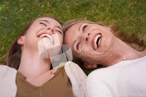 Image of Mother, daughter and grass with smile, bonding and love with happiness in field. Women, motherhood and lawn for growth, connection and positivity while relaxing with summer sunshine and joy or fun
