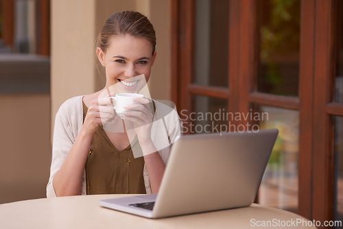 Image of Happy woman, portrait and coffee with laptop on table for morning, remote work or drink at home. Young female person or freelancer with smile, beverage or cup of tea by computer for online networking