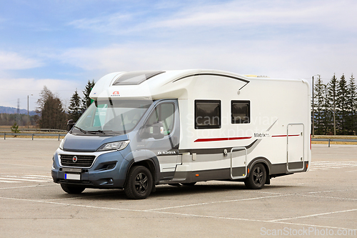 Image of Adria Matrix Plus Motorhome Parked on Asphalt Yard