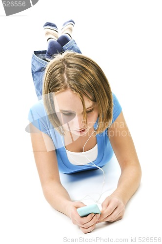 Image of Teenage girl listening to music