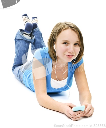 Image of Teenage girl listening to music