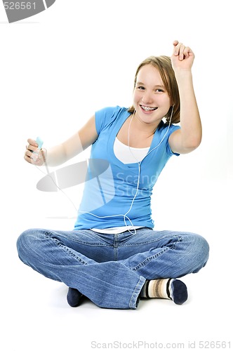 Image of Teenage girl listening to music