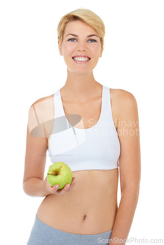 Image of Woman, portrait and apple in studio for fitness, wellness or diet on white background, mockup or backdrop. Model, dietician or nutritionist with green fruit for cleanse, vitamins and workout