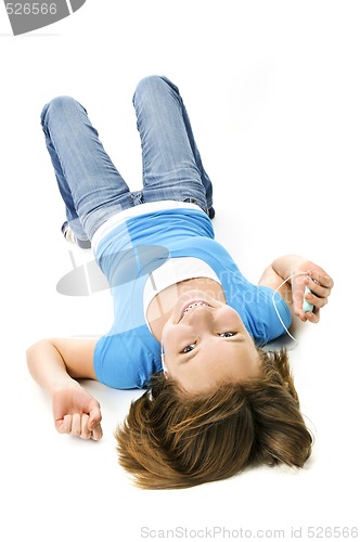 Image of Teenage girl listening to music