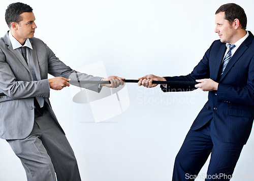 Image of Businessmen, suits and determined with holding rope for competition, conflict and challenge. Male business people, standing and tug of war and drive with mockup in studio on white background