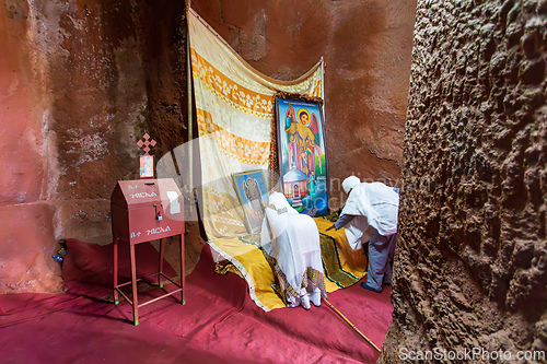 Image of Orthodox christian Ethiopian people inside famous rock-hewn church, Lalibela Ethiopia people diversity,