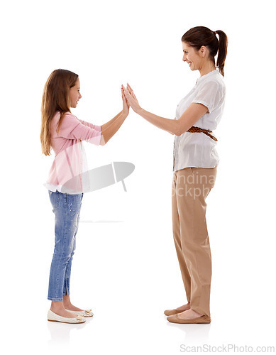 Image of Mother, child and clapping game for bonding and fun together in studio, happy and playful on white background. Woman, young girl and hands together, playing with high five and family time for love