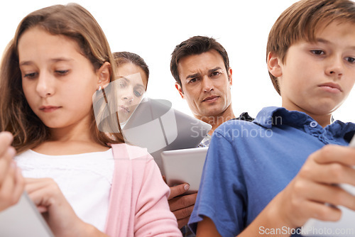 Image of Mother, father and children with tablet on a white background for internet, website or online games. Family, ignore and mom, dad and kids on digital tech for streaming, connection or videos in studio