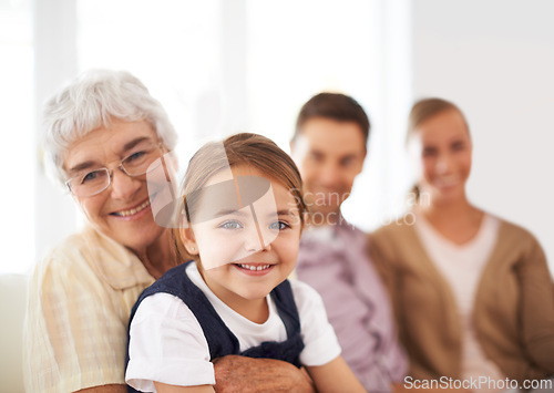 Image of Portrait, family and happy kid with grandmother in home for bonding, love or care together with parents. Face, grandma and girl child with mother and father in living room with smile for connection