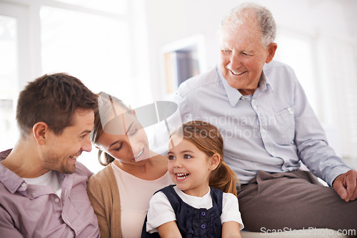 Image of Parents, grandfather and child with happiness on sofa for healthy development, security or comfort in apartment. Family, men and woman with girl kid, smile and bonding for parenting and love in house