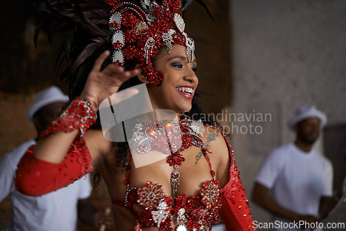Image of Carnival, dance and woman in costume for event in Brazil, performer or dancer with gemstone outfit outdoor. Music, band and samba with happiness for entertainment and culture, festival and talent