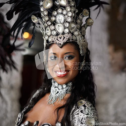 Image of Brazilian woman, dancer and portrait of street performer in carnival for music and professional entertainer in band. Young passista, face and happy in feathers and costume for rio de janeiro festival