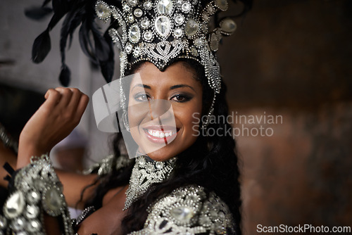 Image of Portrait, woman or dancer to smile for carnival, costume and jewelry with sparkle, bling or diamante. Black female person, red lipstick and dancing with energy, action and movement in Rio de Janeiro