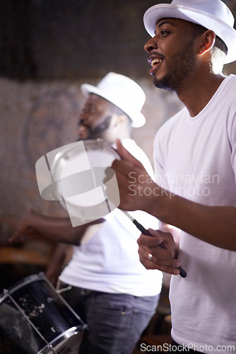 Image of Music, concert and man with tambourine, percussion instruments and band mate on stage in Sao Paulo. Happy black men, drummer and musician for playing, singing and dancing in night club performance