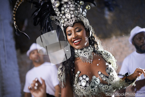 Image of Carnival, samba and woman as dancer in Rio de Janeiro, joy and performance for crowd with energy. Female person, artist and clothes from feather for fashion with culture, music and celebration