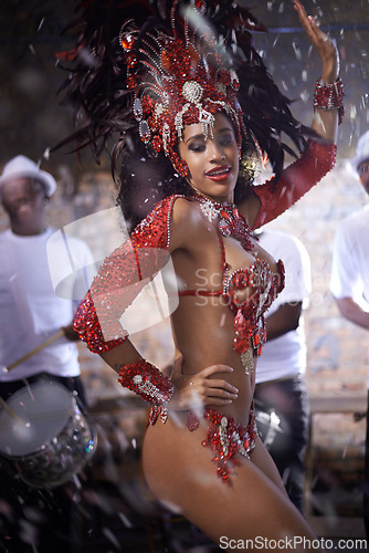 Image of Carnival, woman with dance in street and confetti for performance in Brazil, costume and feather head gear outdoor. Music, samba and event with energy, culture for festival entertainment and talent