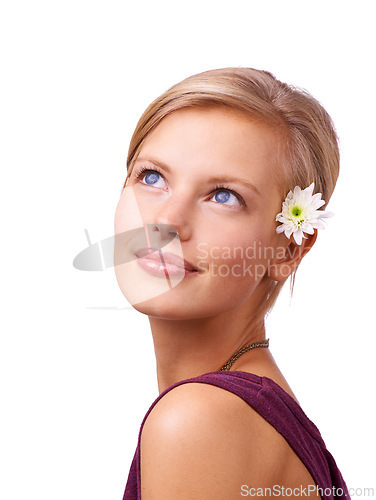 Image of Woman, closeup and face with flower isolated on white studio background for beauty, cosmetics and makeup campaign. Female person, model and smile in happiness for skin care, glamor and elegance