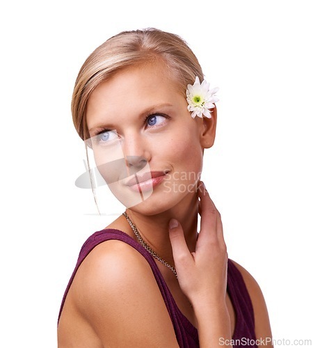 Image of Studio, young woman and thinking with flower by white background for natural skincare with botanicals. Model, cosmetology or inspiration with daisy for stress relief or spa wellness with floral plant