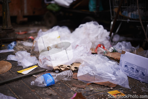 Image of City, pollution and garbage or trash on street, landfill and junkyard or destruction of climate. Outdoors, waste and ecological disaster or global problem, disposal and environment of dirt in town