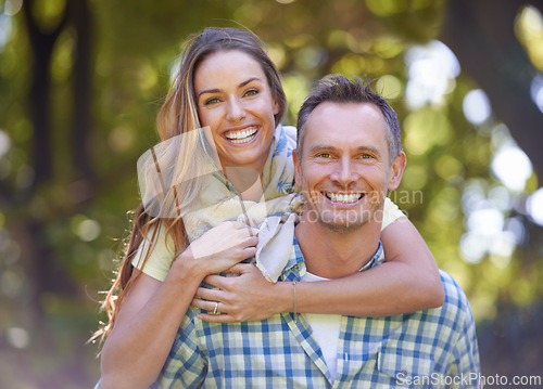 Image of Portrait, embrace and couple with smile in park for summer romance, trees and fun outdoor date. Love, mature man and happy woman in garden with morning sunshine, hug and marriage bonding in nature.