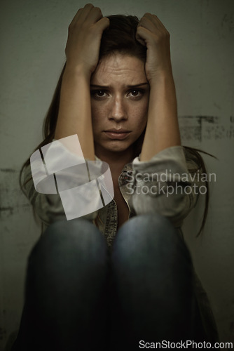 Image of Portrait, horror and terrified woman in fear, panic or worry as victim of abuse or nightmare. Stress, depression and mental health with scared young person in danger of anxiety, burnout or breakdown