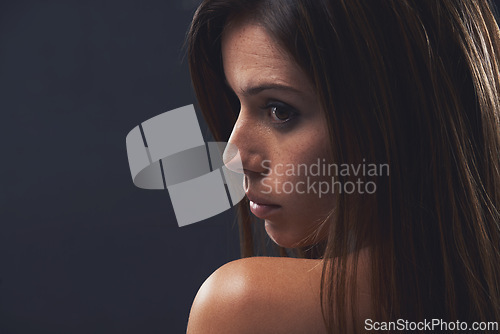 Image of Woman, facial treatment and beauty in studio, cosmetics and promotion of skincare on black background. Female person, mockup space and profile for dermatology, confidence and pride for glowing skin